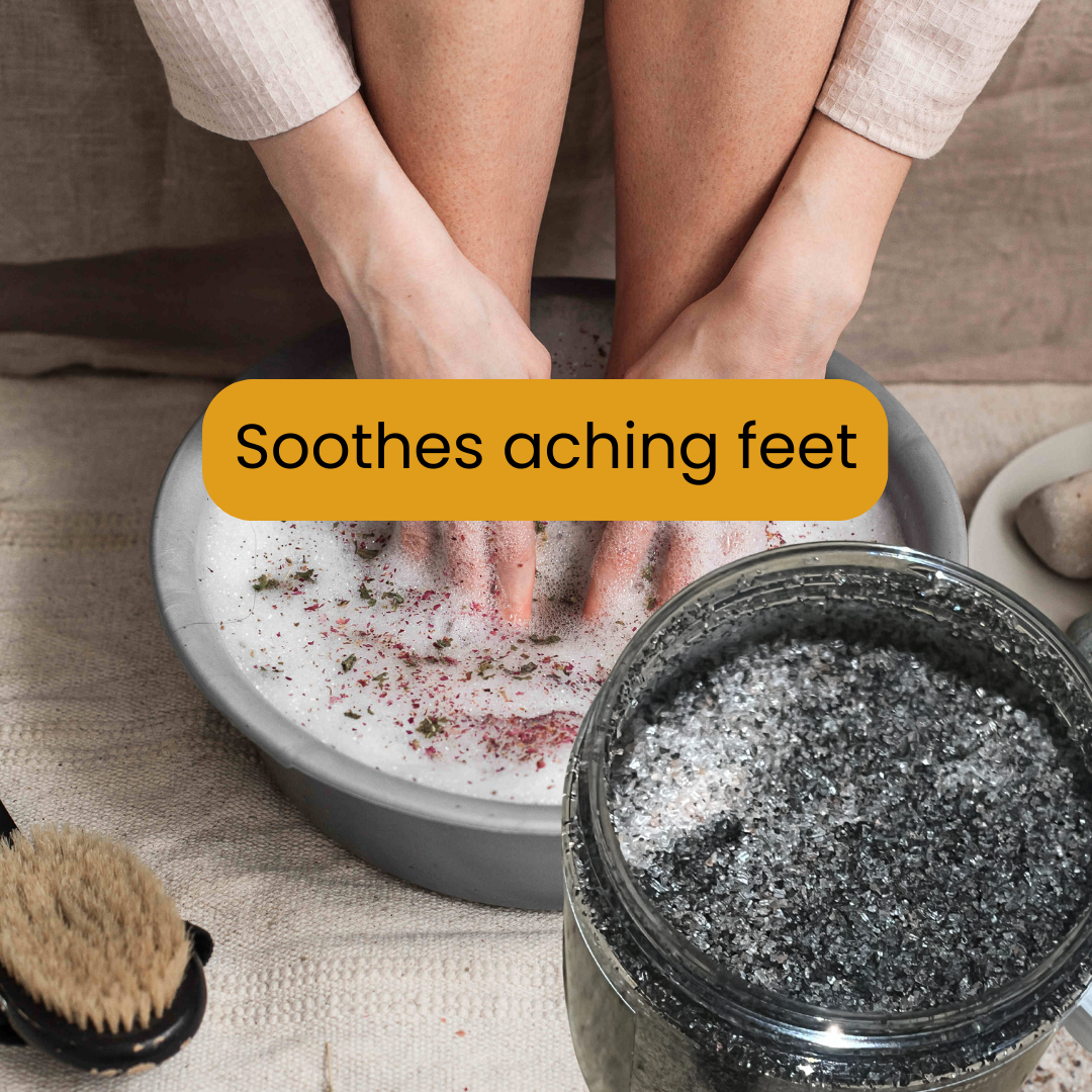 Woman Soaking Feet in Salt Soak - Azizah Healing Self-Care